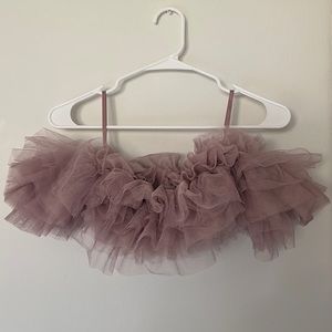 Pink Free People top, arm sleeves, ruffles.